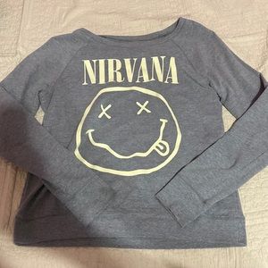 Nirvana sweater with yellow design in front and no design in the back.